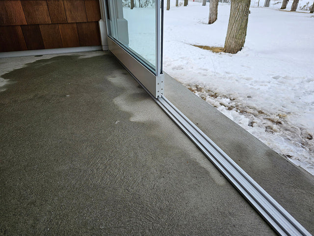 Porte vitrée sans cadrage